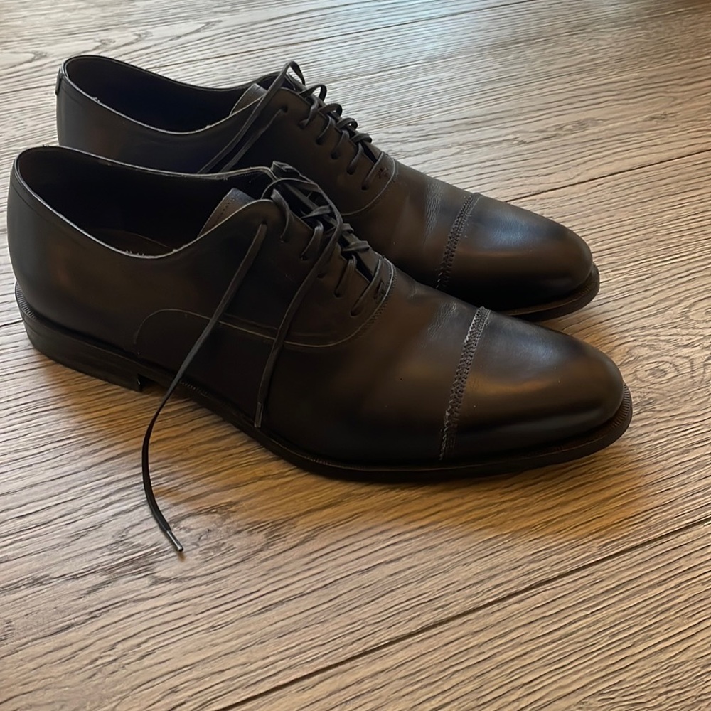 Salvatore Ferragamo Black cap toe dress shoes.  9.5 D